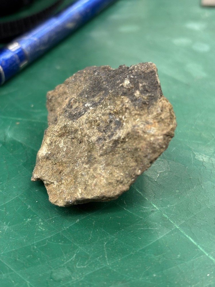 as gold ore on green stone