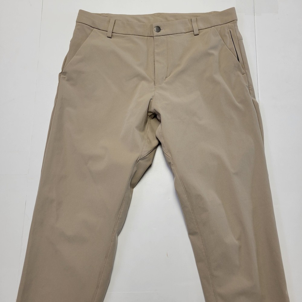 LULULEMON Commuter Pants Men's 34x33 Beige Polyester Flat Front Performance 34