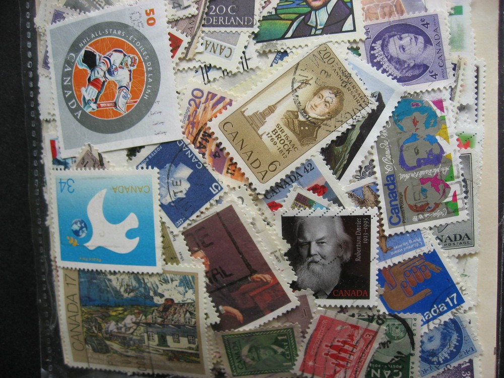 Canada colossal mixture(duplicates,mixed cond) 4000 old,new,35%comems,65%defins