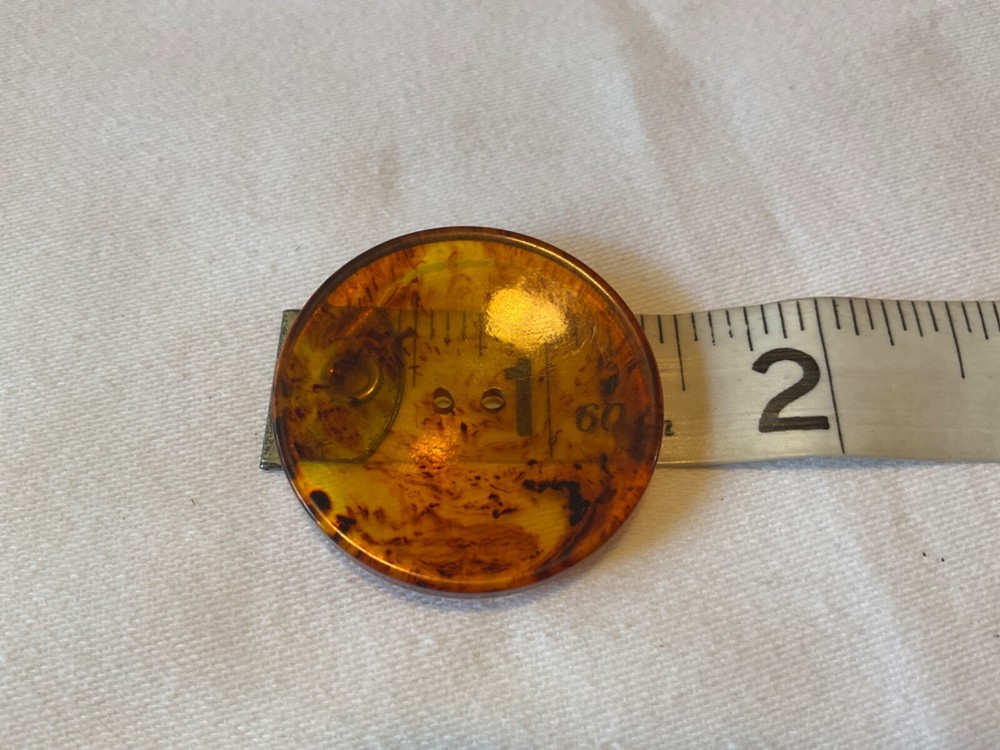 THREE TRANSLUCENT AMBER COLOR BUTTONS 1. 5/16”