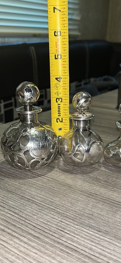 Circa 1905 elegant .999 fine solid silver lined aroma bottle set made by leading