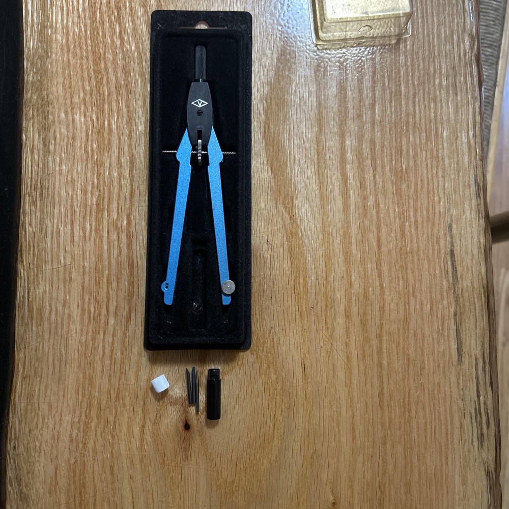 Lot of four drafting compasses