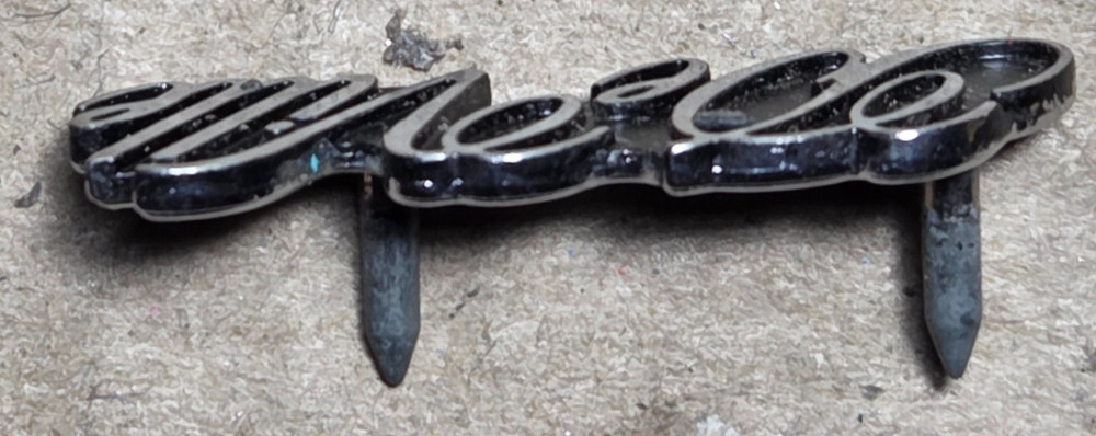 CADILLAC DEVILLE CIRCA '78 DASH EMBLEM 1610411 (6634}