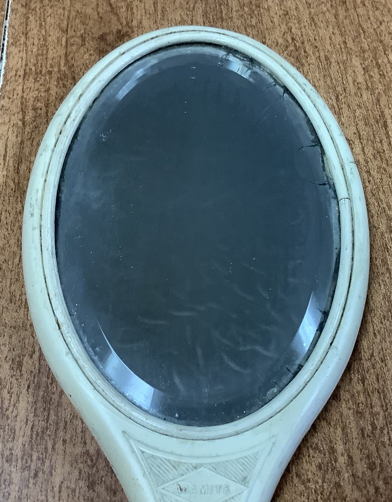 Vintage Hand Held Vanity Mirror .