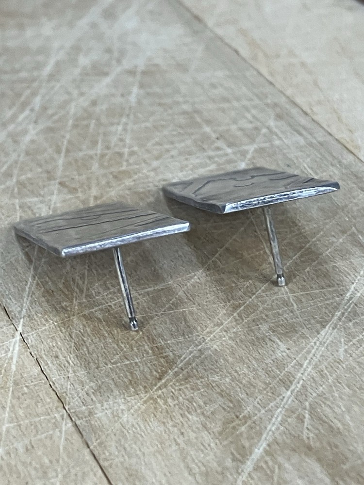 Handcrafted sterling silver studs featuring oxidized Southwestern Style Native