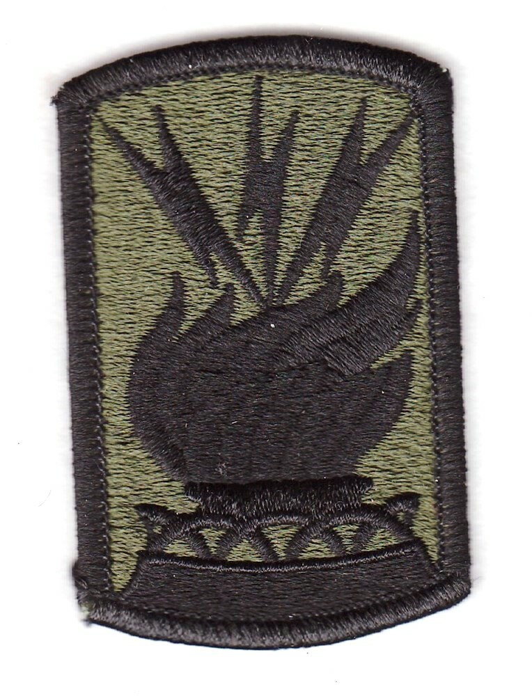 Army Patch: 187th Signal Brigade - merrowed edge, subdued
