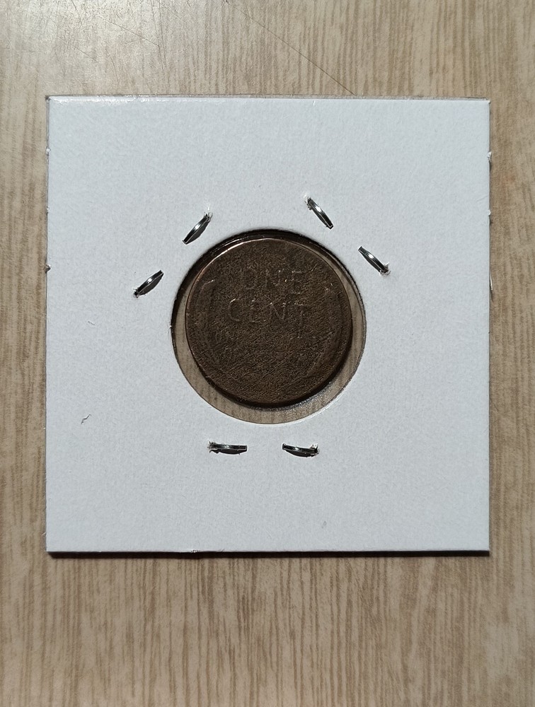 1957 d wheat penny error 2.33 gr. Planchette
