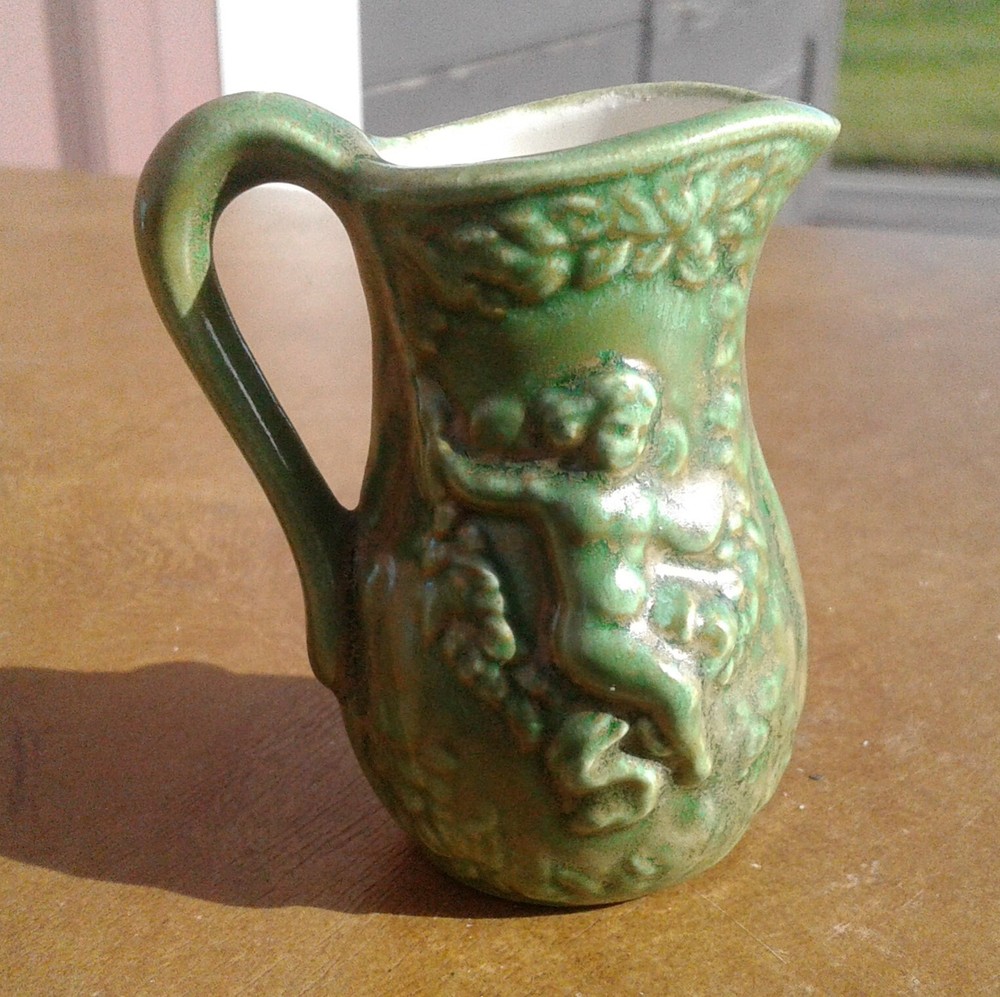 Vintage Miniature Green Pitcher with Embossed Cherubs