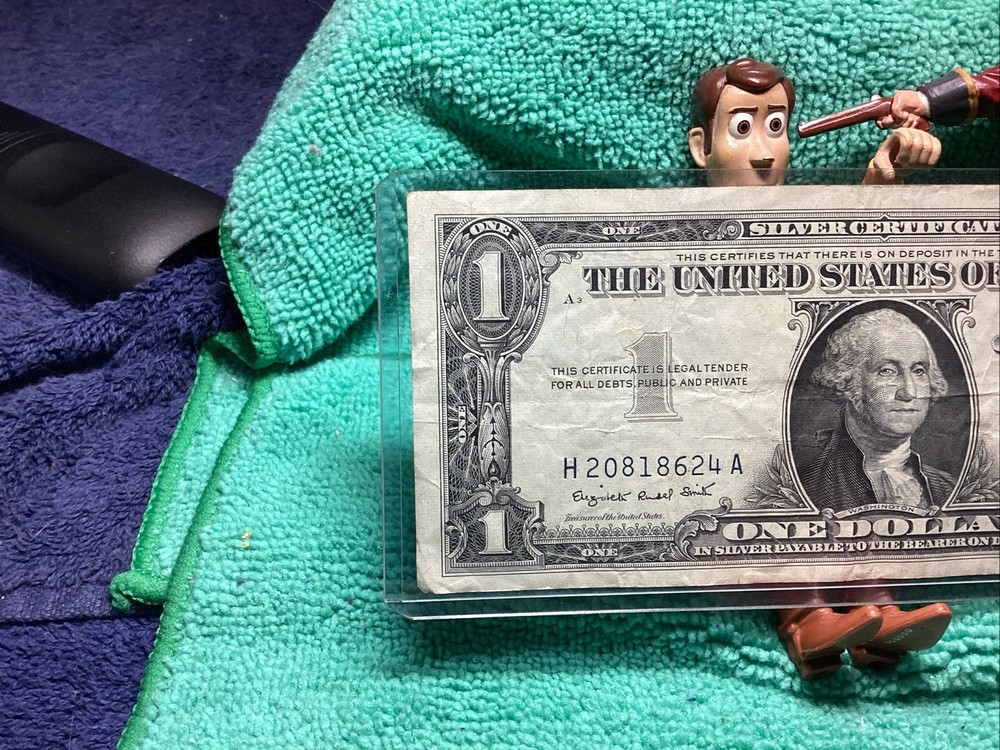 1957 A SILVER CERTIFICATE EF in RIDIG HOLDER🦅