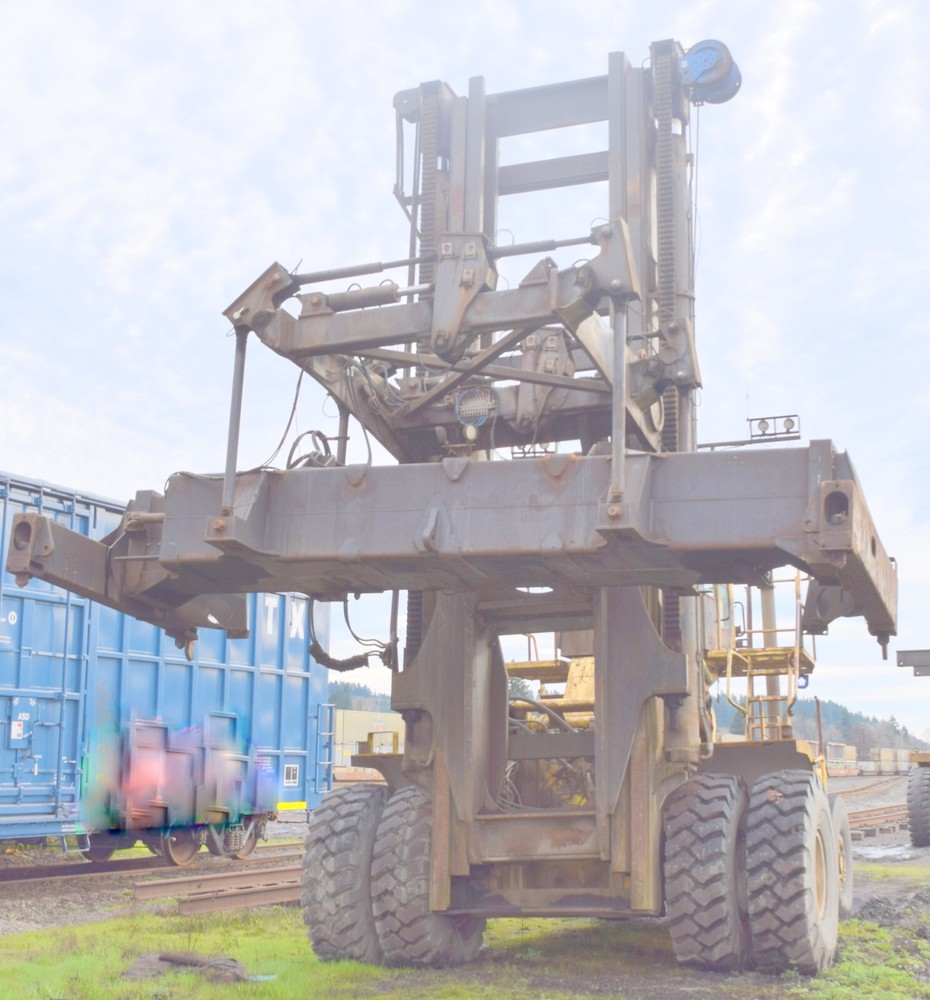 Hyster H 1050 E forklift with, container handler Attachment, Cummins M-11,