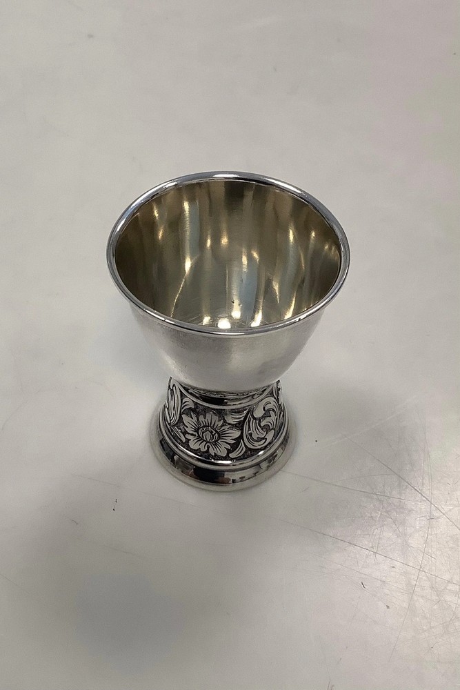 Egg cup in silver with ornamentation