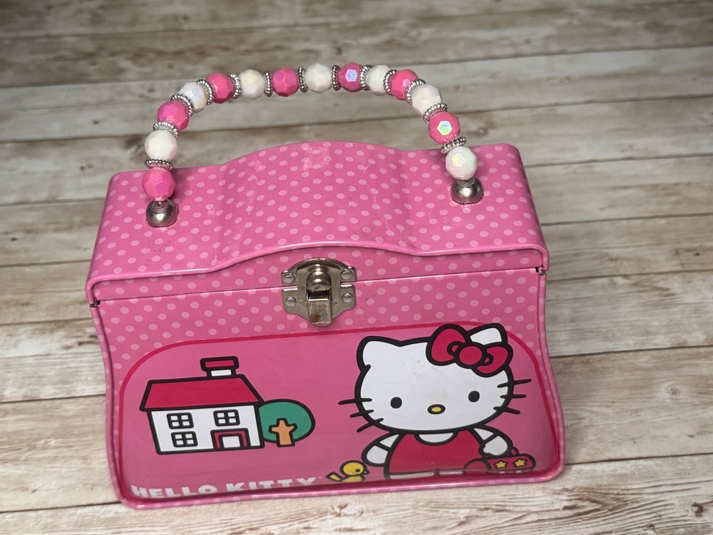 Hello Kitty 2012 by Sanrio Tin Purse Lunch Box with Pink White Beaded Handle