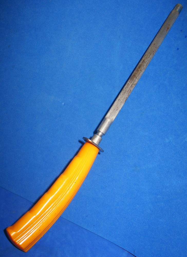 MCM Butterscotch Bakelite Handled Sharpening Steel