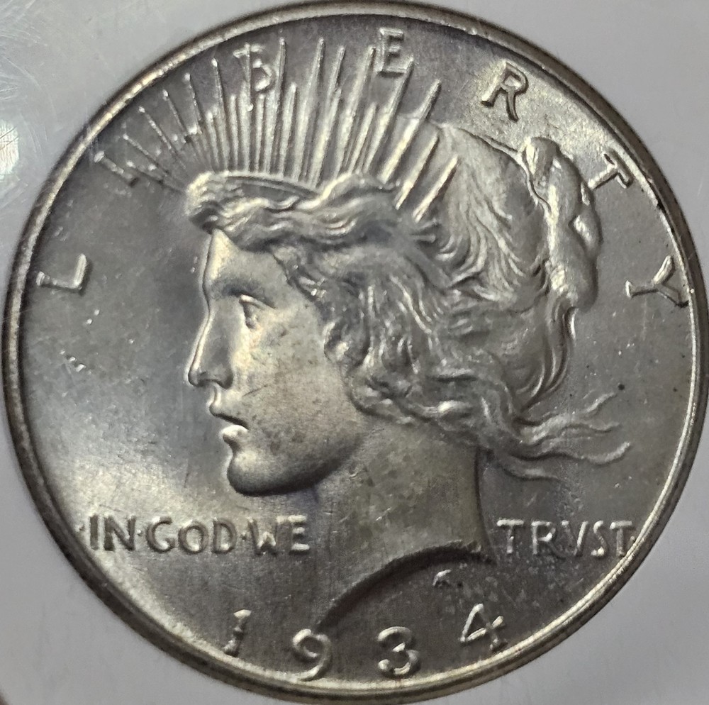 1934 Peace Dollar MS-64 NGC VIDEO