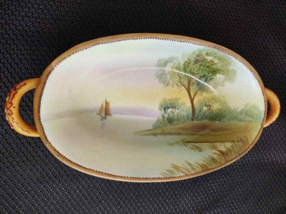 Nippon hand painted handled candy bowl/hand painted scene