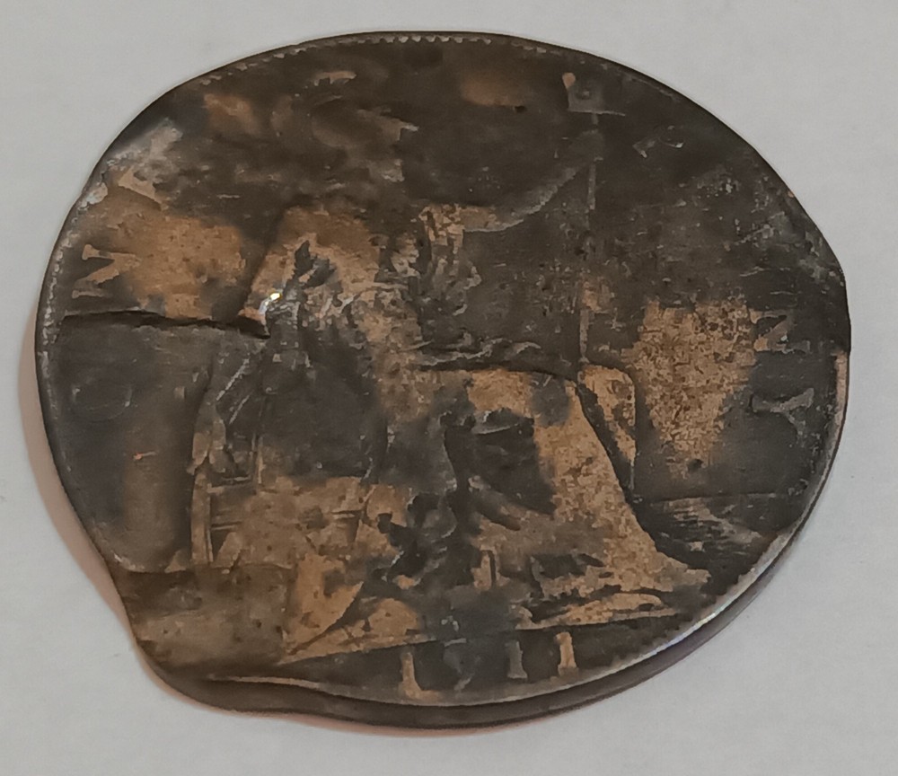 George V and George VI coins with error