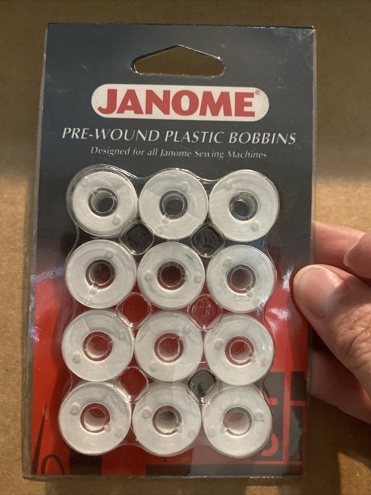 Janome Genuine 12-Pack White Pre-Wound Plastic Bobbins (SB)