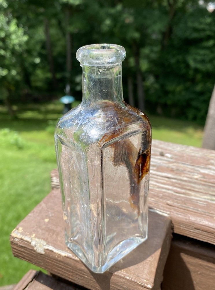 The Singer Sewing Machine Co Bottle