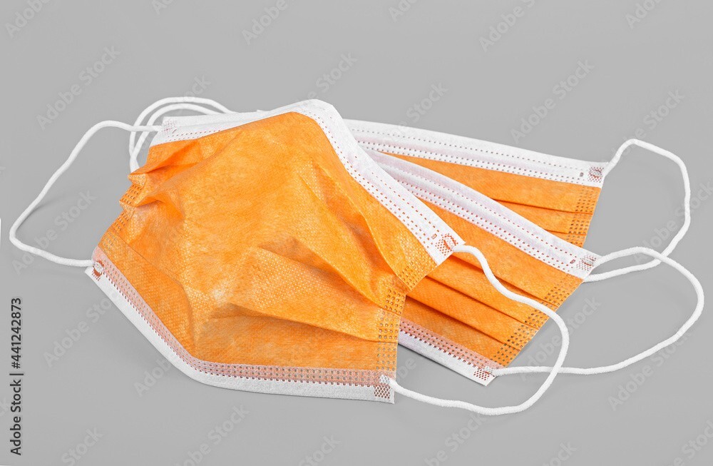 three layer Face Mask Covering, Disposable Protective Mask (Orange) 50 Per Box.