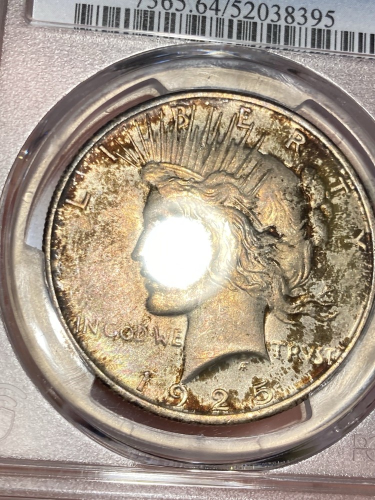 1925 PCGS MS64 Peace Silver Dollar - Toned - Crusty & Original!
