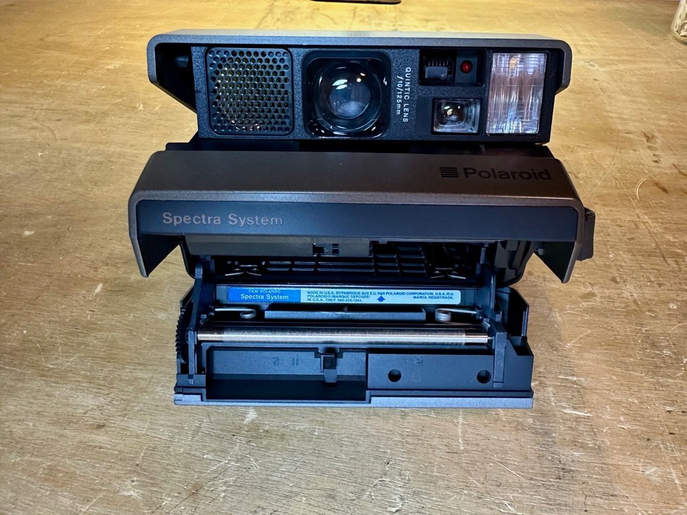 POLAROID SPECTRA SYSTEM CAMERA WITH STRAP CASE & MANUAL UNTESTED