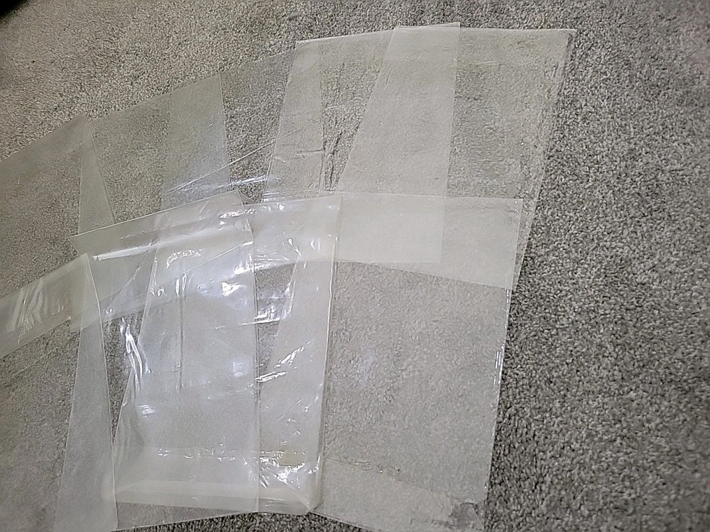 9 Comic Book Resealable Sleeves - Used