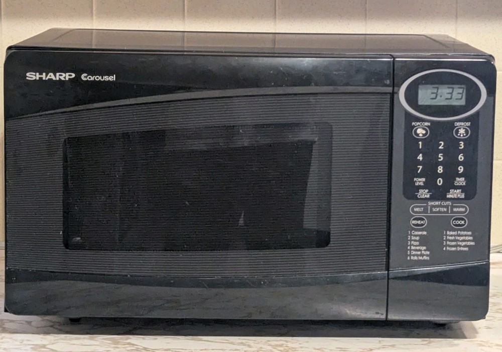 Sharp Carousel Vintage Black Countertop Microwave Model R-2009KK