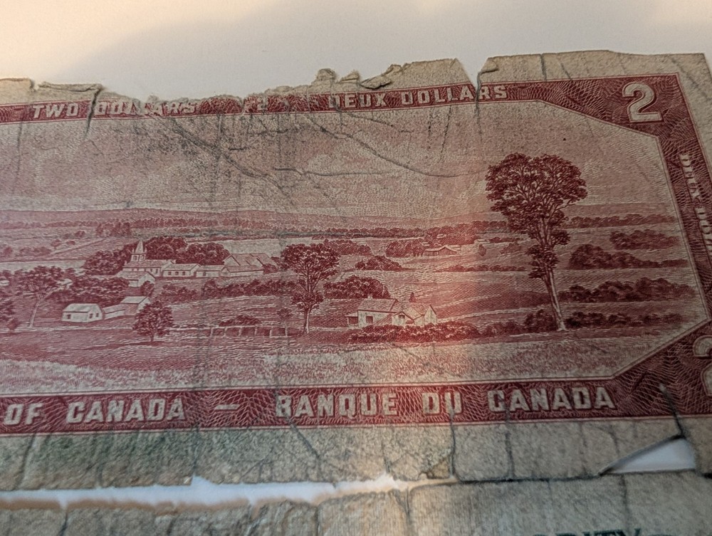 $2 Canadian Note. $1 Bahamas Note