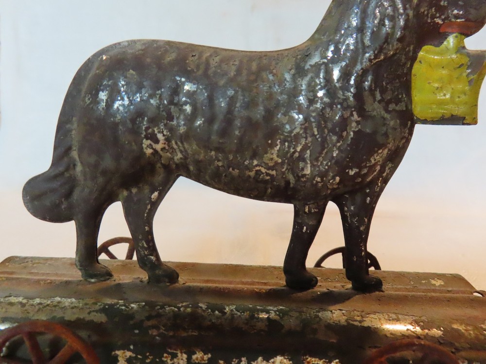 Antique tin dog pull toy