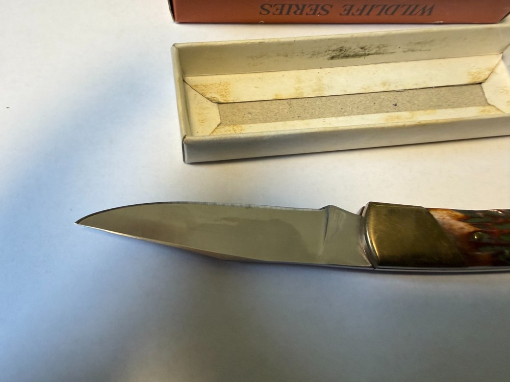 leopard genuine pick bone stag handle knife