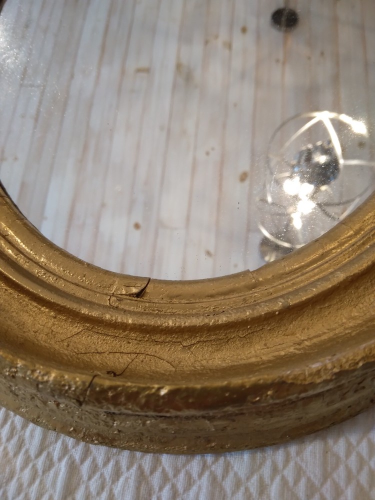 Antique Oval gilt Victorian mirror.