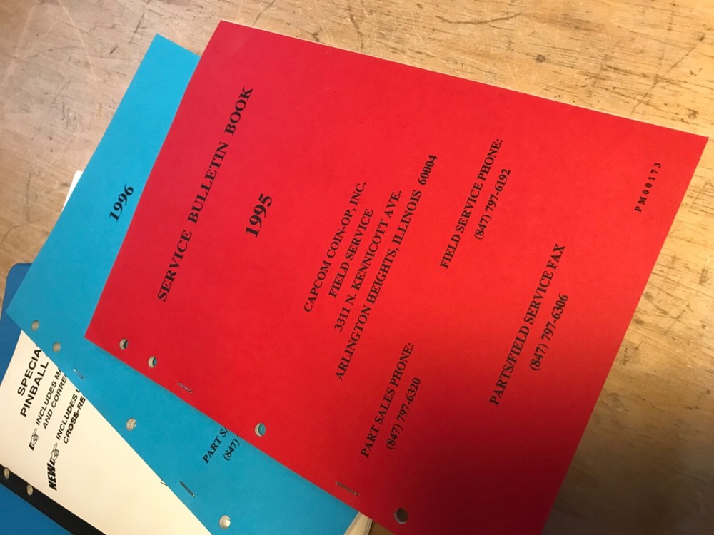 Capcom Service Bulletins Binder with Arcade Pinball game manuals, service, notes