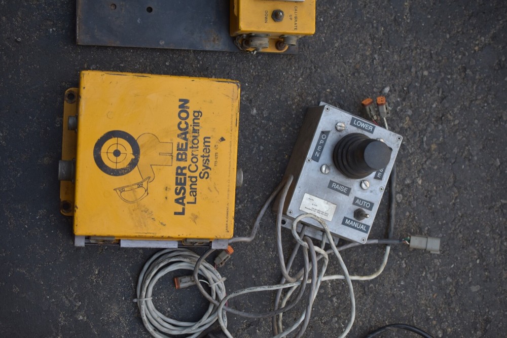 Laser alignment beacon land contouring system