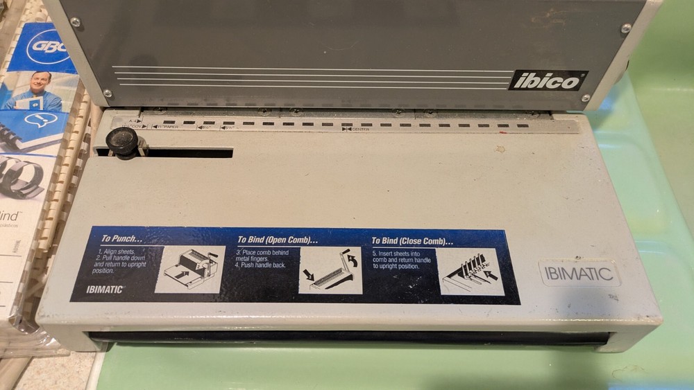 Ibico office machine for binding with two packages of combing material.