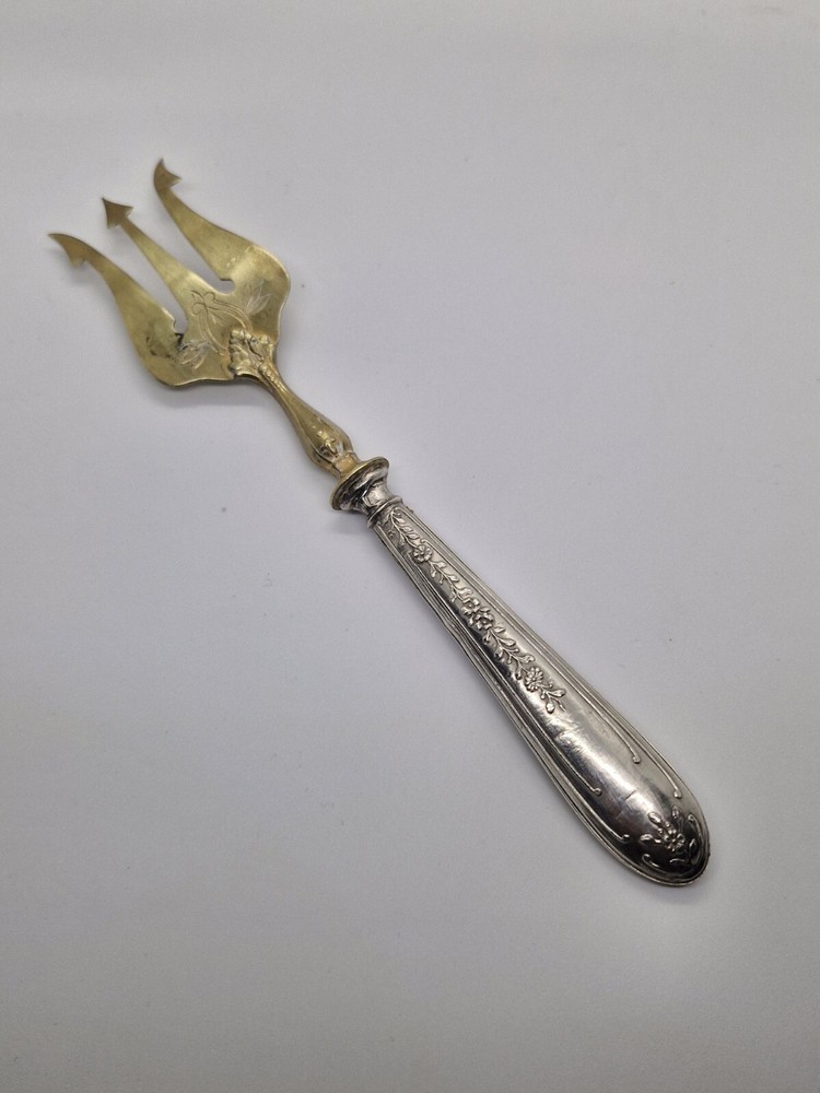 Vintage Antique brass fork with silver handle