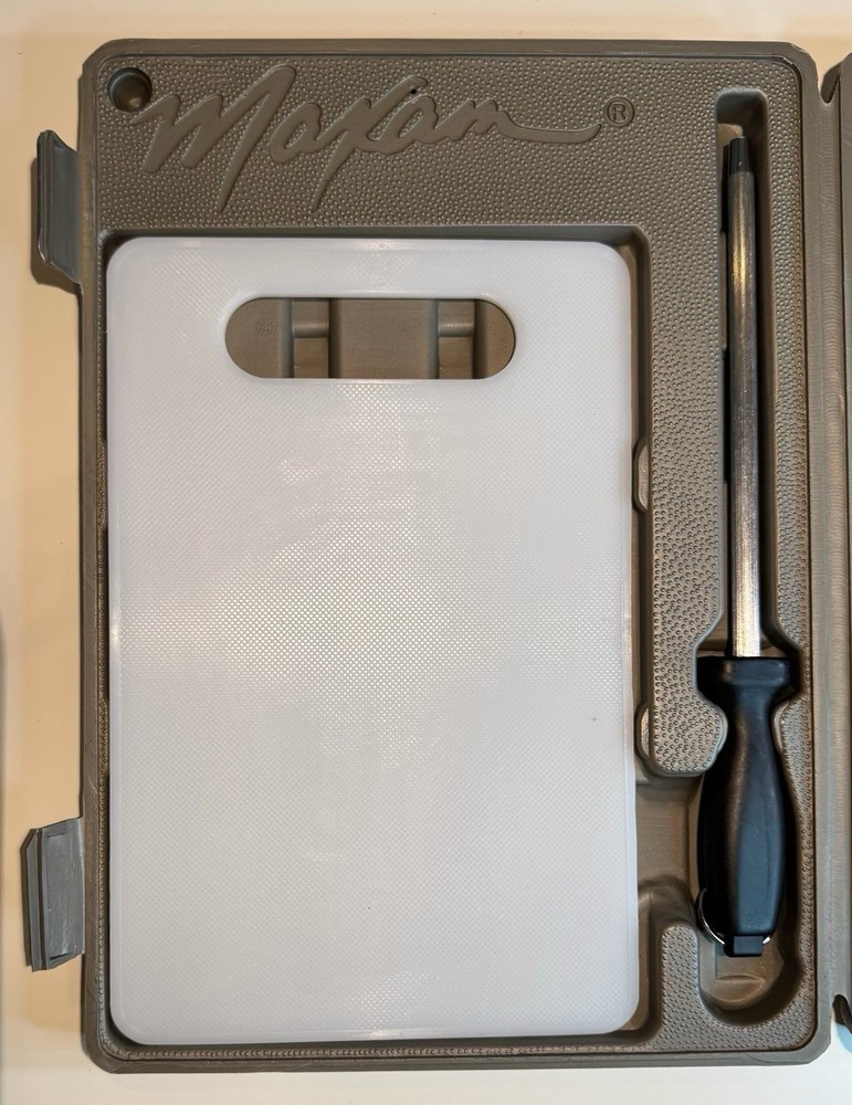 Fishing and game processing knife set in hard plastic case by Maxam.
