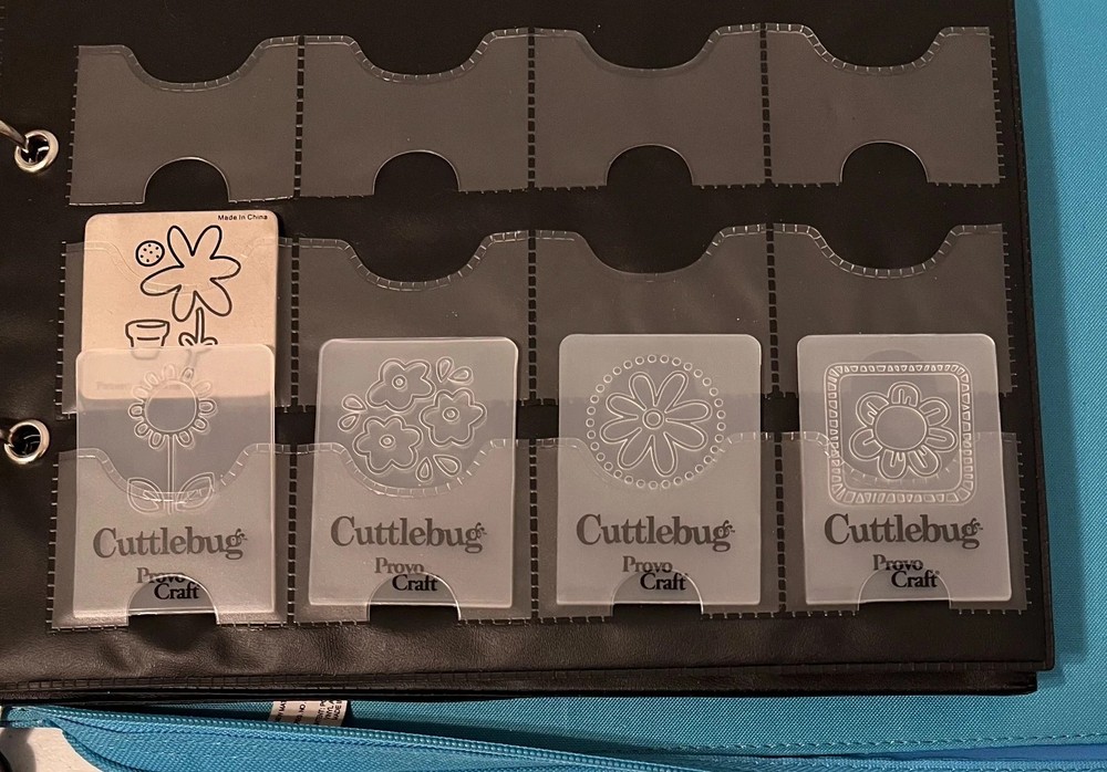 Cuttlebug Storage Binder + 42 Cutting and Embossing Folders + 7 Pouch Page Lot