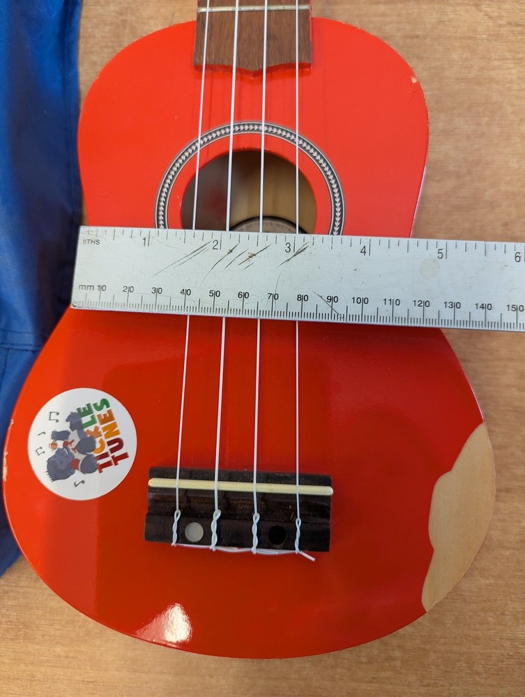 Octopus Soprano Ukulele Red with 4 Strings Includes Case for Beginners