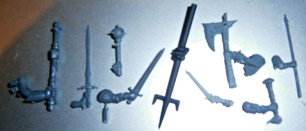Warhammer various weapons-in-hands bits x9 pieces