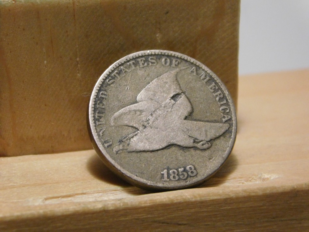 1858 Flying Eagle cent error, lamination across the center