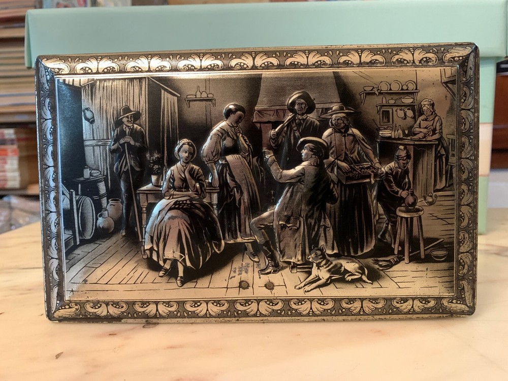 VINTAGE RUBENS EMBOSSED TIN BOX KEYLESS BOX