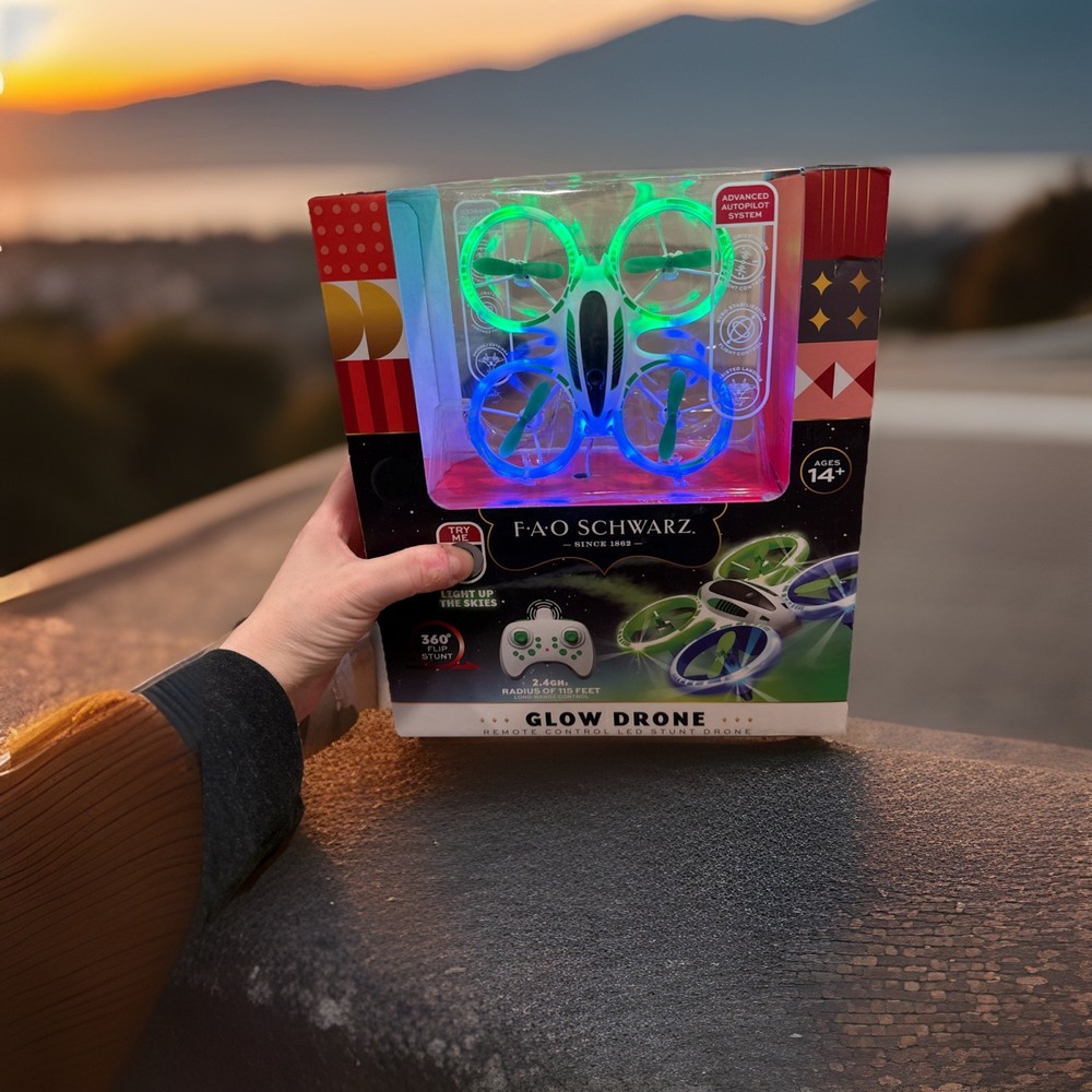 FAO Schwarz Glow Drone Remote Control LED Stunt Drone Advanced Autopilot System