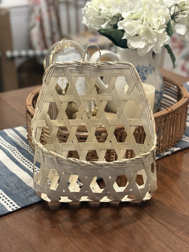 Vintage woven hexagonal pattern basket with rope handle.