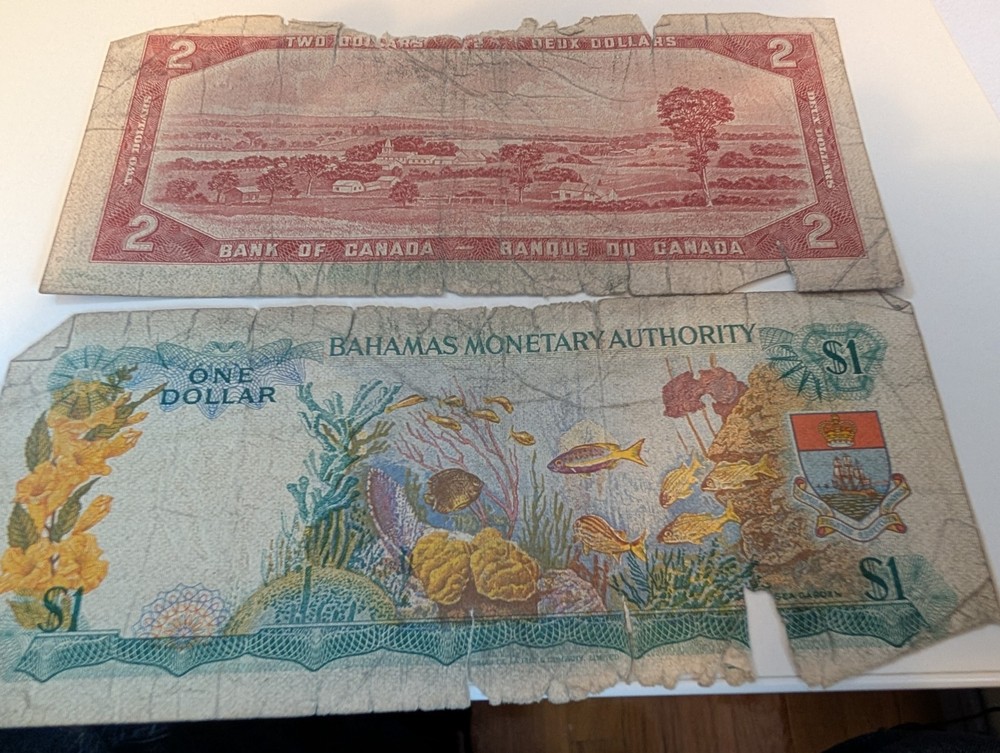 $2   Canadian Note.      $1     Bahamas Note