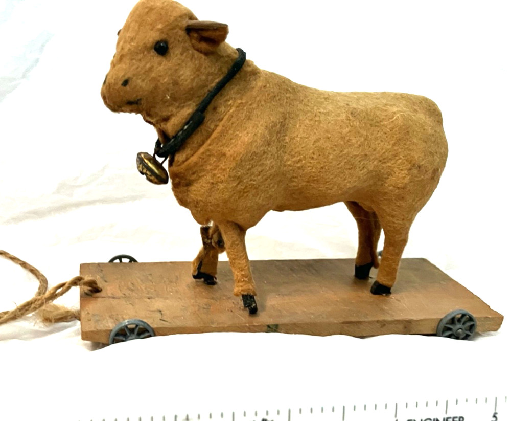 Antique childs felt covered pull toy