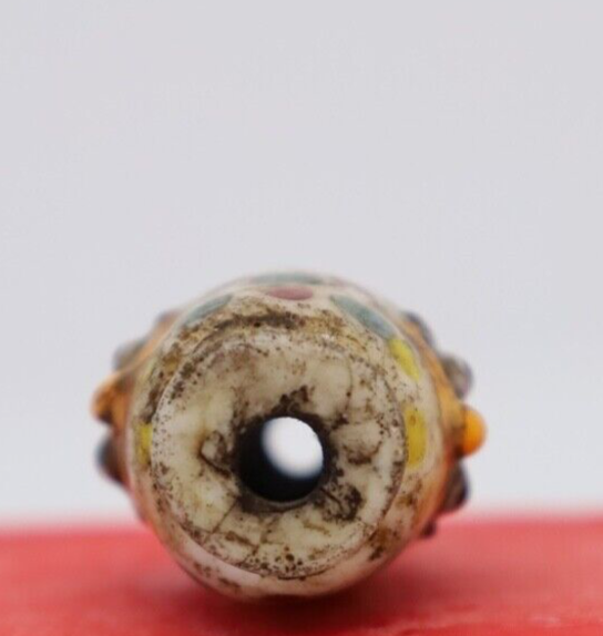 Ancient roman face bead