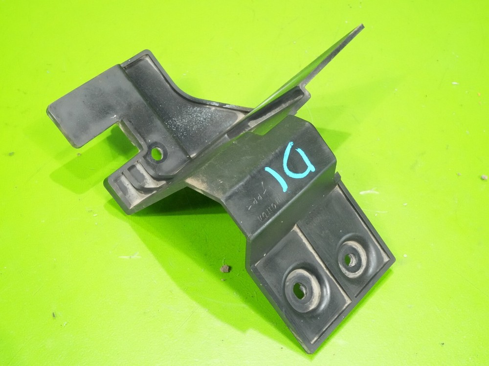 92-96 Prelude OEM passenger right front bumper baffle plate bracket mount