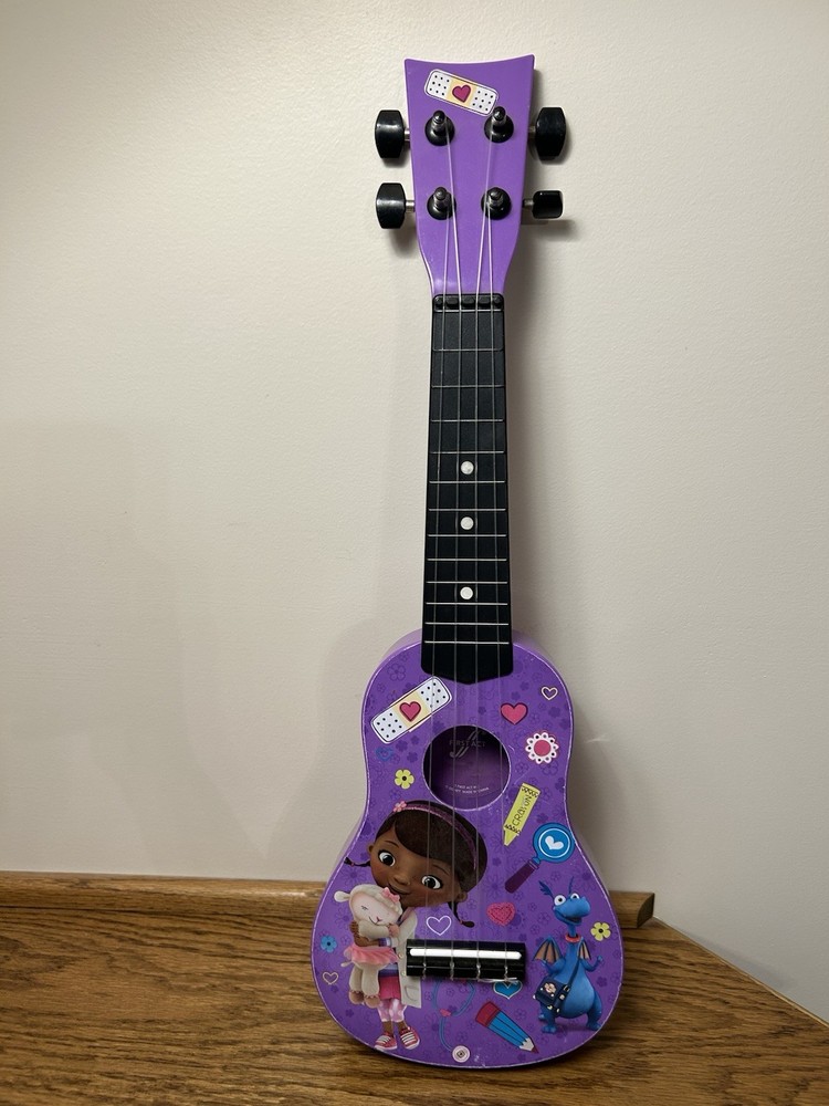 Doc McStuffins First Act Mini 4 String Kids Guitar