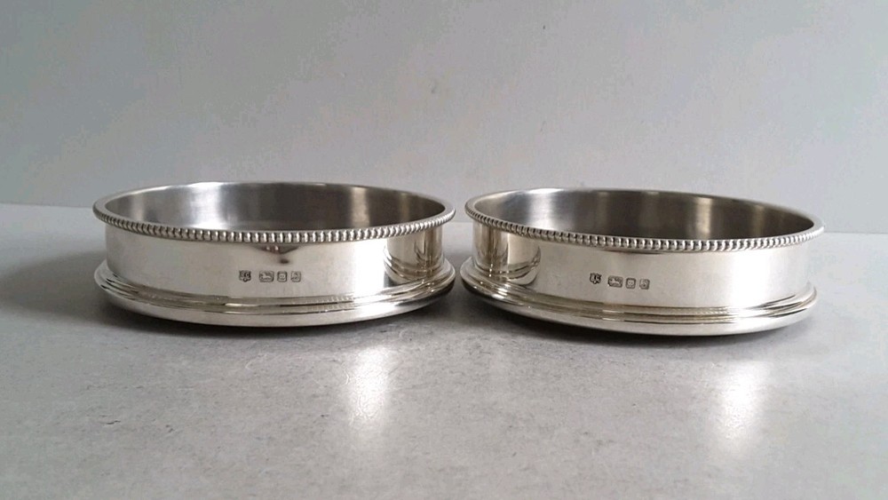 GOOD , PAIR VINTAGE SOLID SILVER COASTERS . 12 . 5 cms. dia. LON. 1973