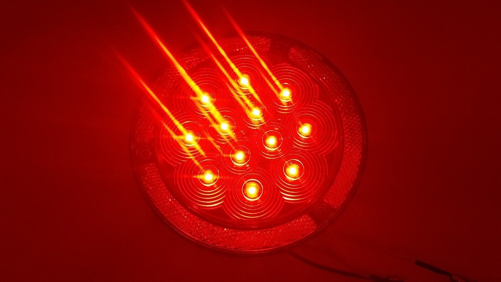 Jammy, Flat 4” Round LED Surface Mount Stop/Tail/Turn Light with Reflector